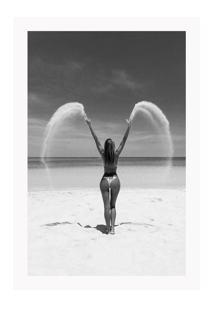 Sexy lady woman throwing sand on a beach in black and white, coastal ocean. 