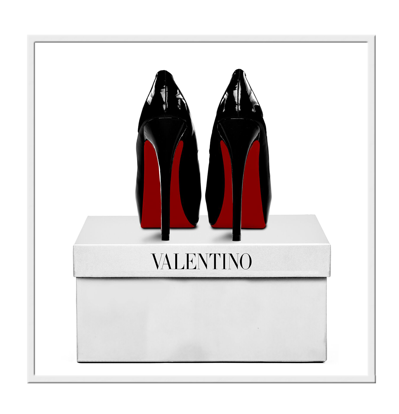 Square photography of red bottom black heels on top of a white valentino box on a white background  