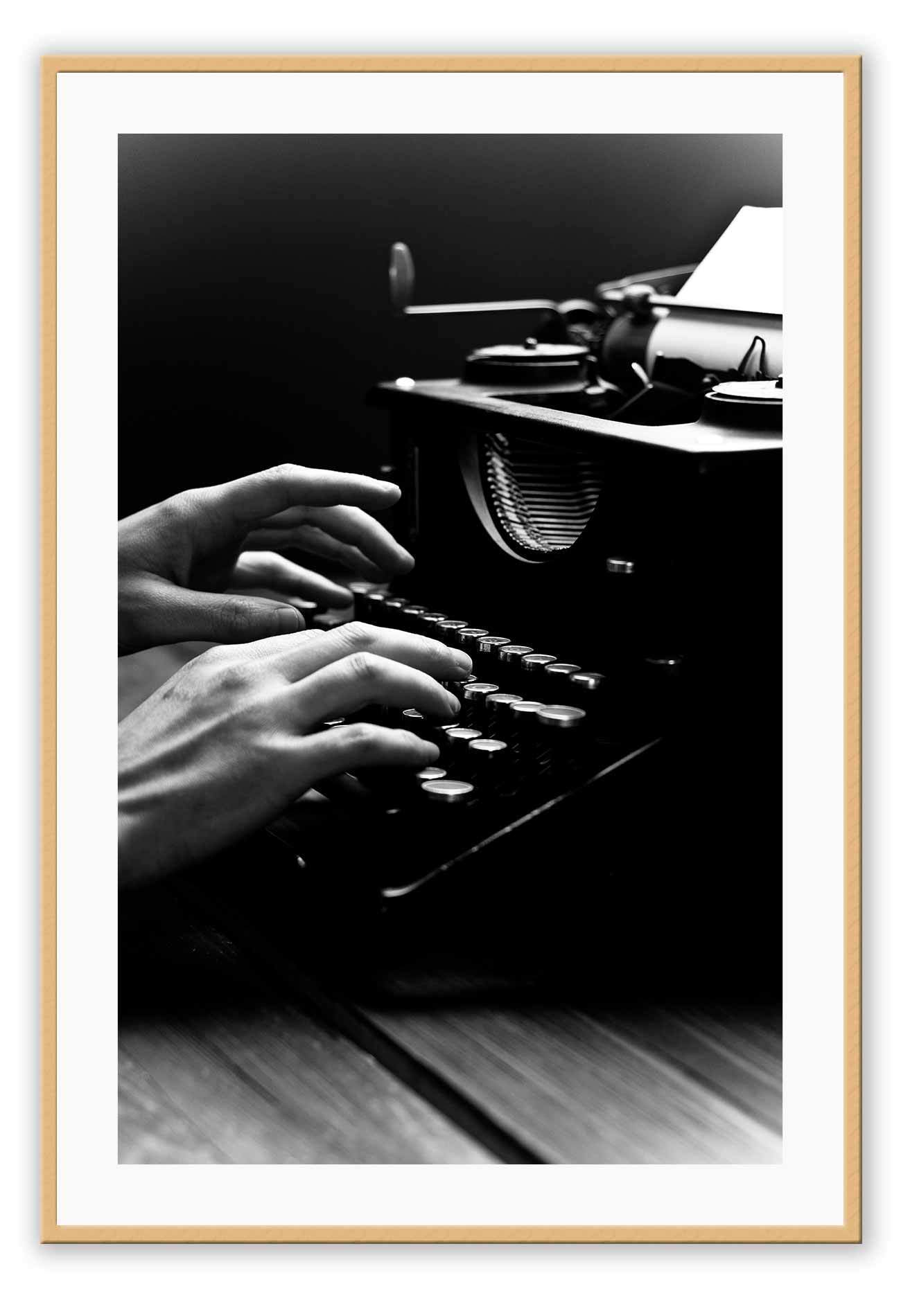 A vintage black and white wall art of a vintage type writer. 