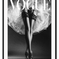 A black and white fashion wall art with ballerina legs on Vogue magazine background. 