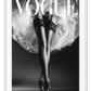 A black and white fashion wall art with ballerina legs on Vogue magazine background. 